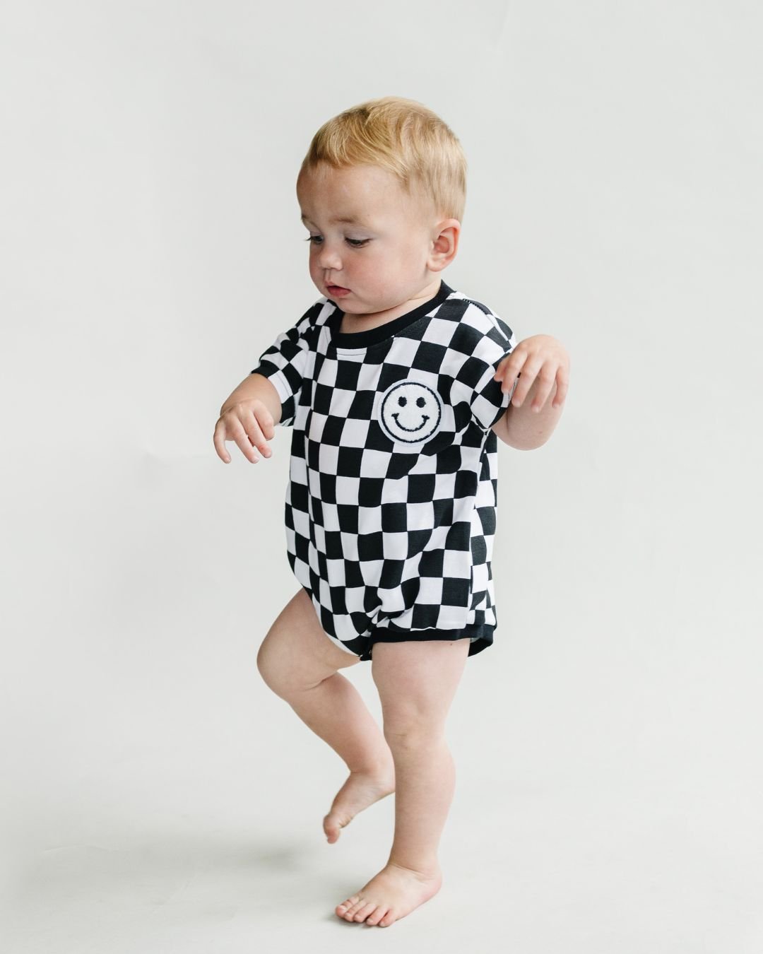 Short Sleeve Bubble Romper | Checkered Smiley Black